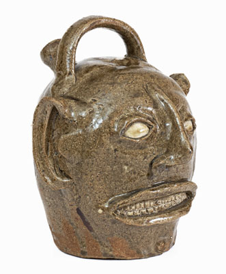 Exceptional Edgefield District, South Carolina Stoneware Face Harvest Jug