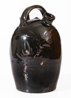 Extremely Rare Albany-Glazed Harvest Jug w/ White-Slip Floral Decoration, attrib. Hissong, Cassville, PA