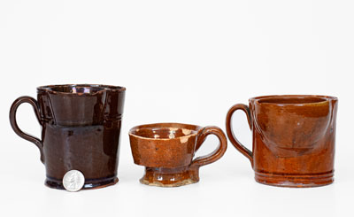 Lot of Three: Glazed Redware Shaving Mugs, American, 19th century