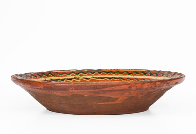 Rare Salem, North Carolina Slip-Decorated Redware Dish, 18th century