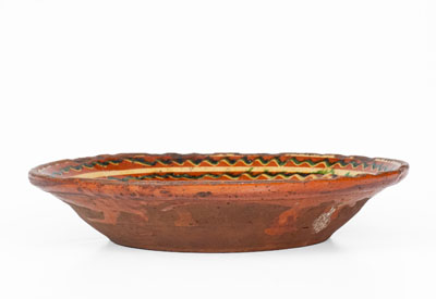Rare Salem, North Carolina Slip-Decorated Redware Dish, 18th century