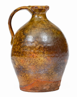 Small Glazed New England Redware Jug, late 18th or early 19th century
