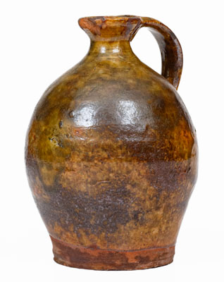 Small Glazed New England Redware Jug, late 18th or early 19th century