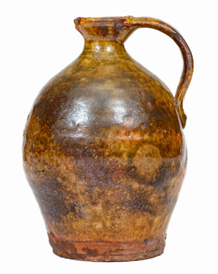 Small Glazed New England Redware Jug, late 18th or early 19th century