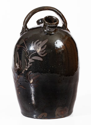 Extremely Rare Albany-Glazed Harvest Jug w/ White-Slip Floral Decoration, attrib. Hissong, Cassville, PA