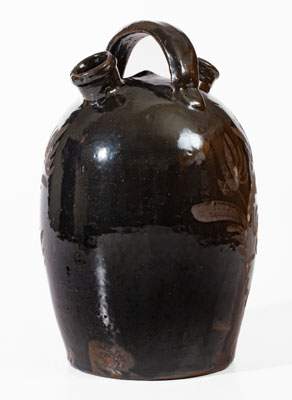 Extremely Rare Albany-Glazed Harvest Jug w/ White-Slip Floral Decoration, attrib. Hissong, Cassville, PA