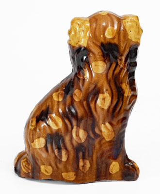 Slip-Decorated Pennsylvania Redware Spaniel, 19th century