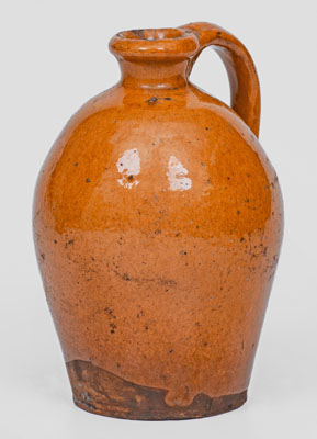 Small-Sized New England Redware Jug, 19th century