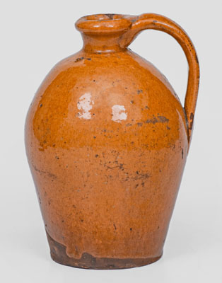 Small-Sized New England Redware Jug, 19th century