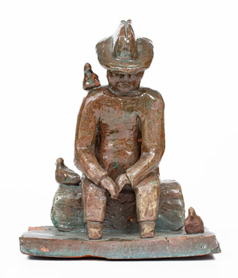 Grand Ledge, Michigan Sculpture of a Seated Man, early 20th century
