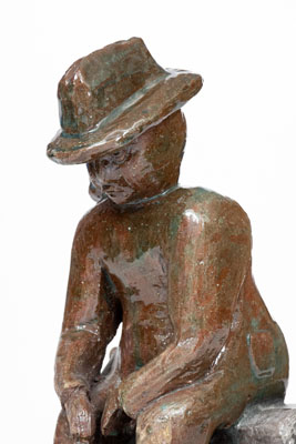 Grand Ledge, Michigan Sculpture of a Seated Man, early 20th century