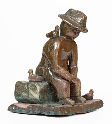 Grand Ledge, Michigan Sculpture of a Seated Man, early 20th century
