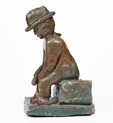 Grand Ledge, Michigan Sculpture of a Seated Man, early 20th century