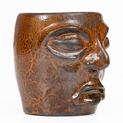 Unusual Redware Face Cup