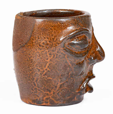 Unusual Redware Face Cup