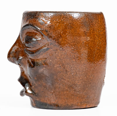 Unusual Redware Face Cup