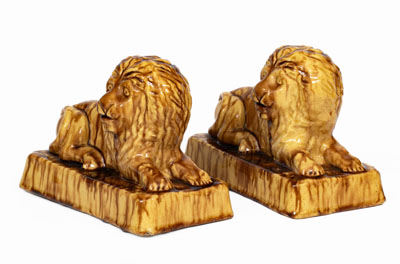 Pair of Yellowware Lion Figures, probably English, 19th century