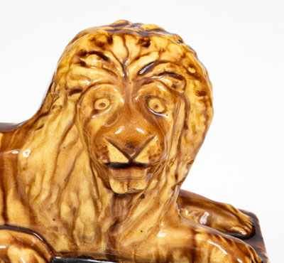 Pair of Yellowware Lion Figures, probably English, 19th century