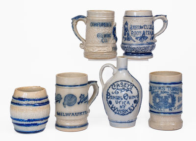 Lot of Six: 5 Whites Utica Molded Stoneware Advertising Mugs and One Elaborate Advertising Jug