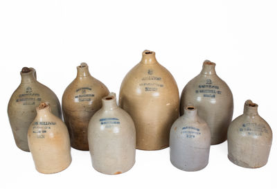 Lot of Eight: Stoneware Jugs with Impressed BOSTON Advertising