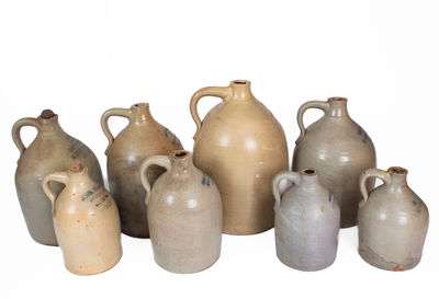 Lot of Eight: Stoneware Jugs with Impressed BOSTON Advertising