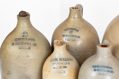 Lot of Eight: Stoneware Jugs with Impressed BOSTON Advertising
