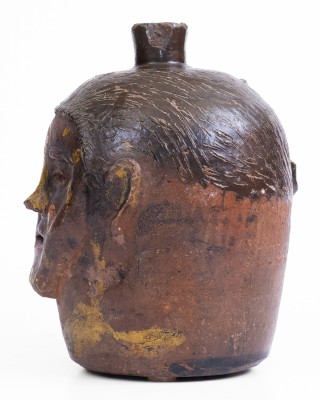 Unusual Southern Stoneware Face Jug with Painted Face