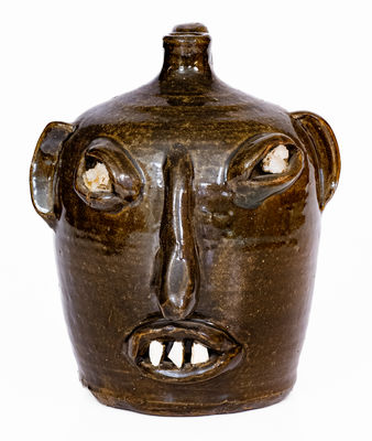 Exceedingly Rare and Important att. Cheever Meaders, Cleveland, GA Stoneware Face Jug, mid 20th century