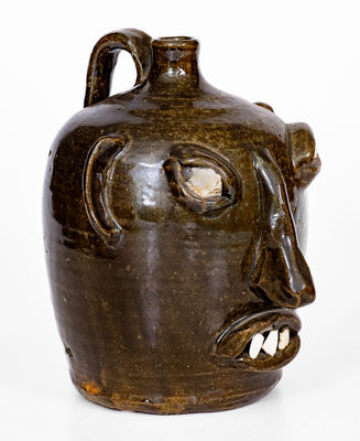 Exceedingly Rare and Important att. Cheever Meaders, Cleveland, GA Stoneware Face Jug, mid 20th century