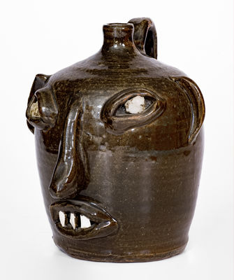 Exceedingly Rare and Important att. Cheever Meaders, Cleveland, GA Stoneware Face Jug, mid 20th century