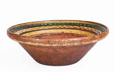 Slip-Decorated Redware Bowl, Mid-Atlantic or Southern origin, early 19th century