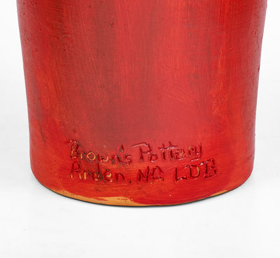 Red-Painted Pottery Devil Face Jug,