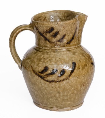 Rare Small-Sized Alkaline-Glazed Stoneware Pitcher with Iron Slip Decoration, attributed to Thomas Chandler, Edgefield District, SC, circa 1845.