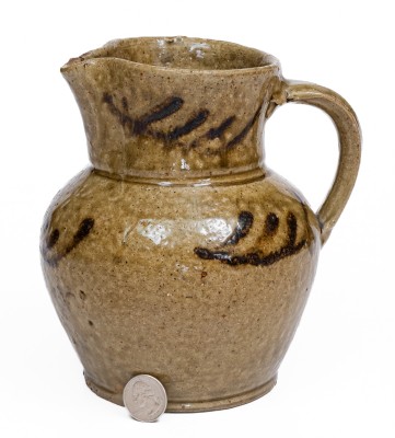 Rare Small-Sized Alkaline-Glazed Stoneware Pitcher with Iron Slip Decoration, attributed to Thomas Chandler, Edgefield District, SC, circa 1845.