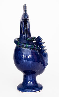 Blue-Glazed Stoneware Figure of a Rooster with Snake, Signed and Dated