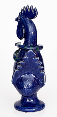 Blue-Glazed Stoneware Figure of a Rooster with Snake, Signed and Dated 