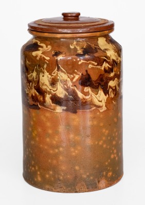 Rare Glazed Redware Jar with Marbled Slip Decoration, New England origin, first quarter 19th century.