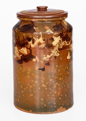 Rare Glazed Redware Jar with Marbled Slip Decoration, New England origin, first quarter 19th century.