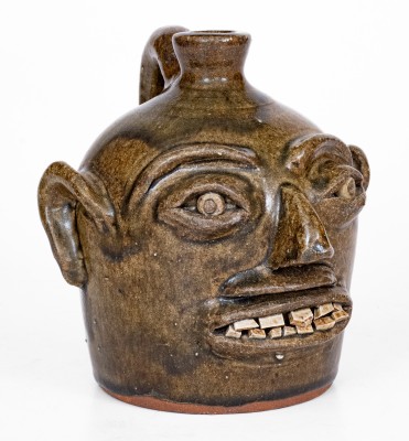Alkaline-Glazed Stoneware Face Jug, Stamped 