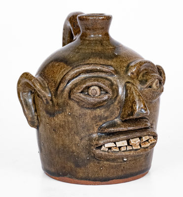 Rare H.F. REINHARDT / VALE, N.C. Alkaline-Glazed Stoneware Face Jug