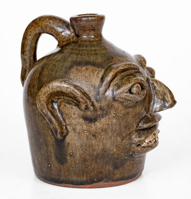 Rare H.F. REINHARDT / VALE, N.C. Alkaline-Glazed Stoneware Face Jug