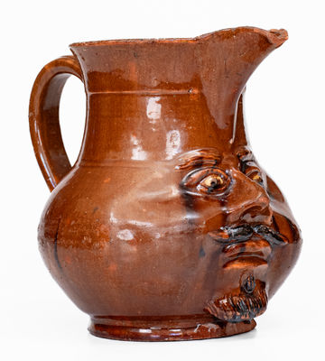 Extremely Rare Pennsylvania Redware Face Pitcher, 19th century