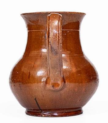 Extremely Rare Pennsylvania Redware Face Pitcher, 19th century