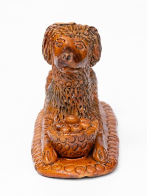 Rare and Important Redware Figure of a Dog with Basket, attrib. John Bell, Waynesboro, PA