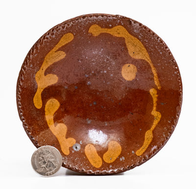 Small PA Redware Plate w/ Yellow Slip Decoration, 19th century