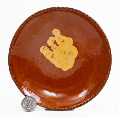 Small Slip-Decorated Pennsylvania Redware Plate, 19th century