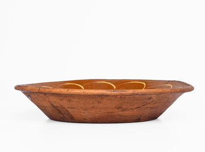 New England Redware Bowl w/ Yellow Slip Decoration, 19th century