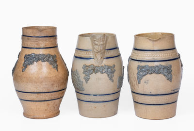 Lot of Three: Whites Utica Stoneware Pitcher w/ Applied Molded Decorations, c1890