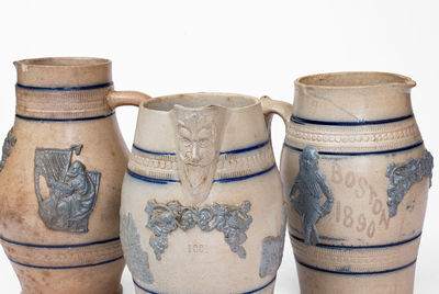 Lot of Three: Whites Utica Stoneware Pitcher w/ Applied Molded Decorations, c1890