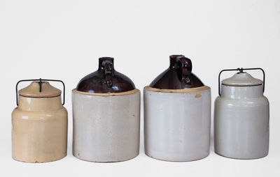 Lot of Four: Stoneware Vessels w/ Paper Labels incl. Marked WESTERN STONEWARE CO. Example